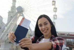 Woman holding her Visa